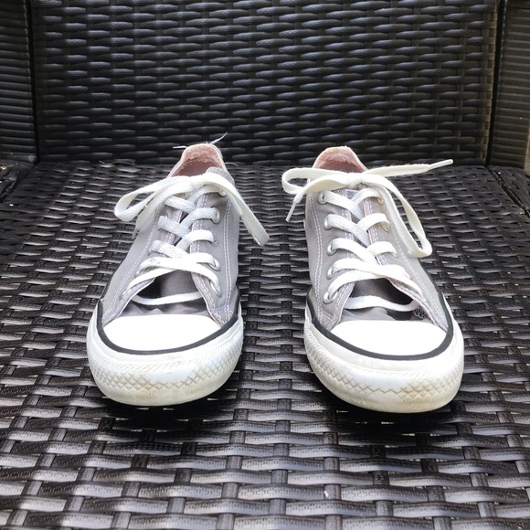 converse with writing on them